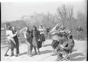 Wurzburg Prints: Freed Slave Laborers Dance on Goebbel's Roof