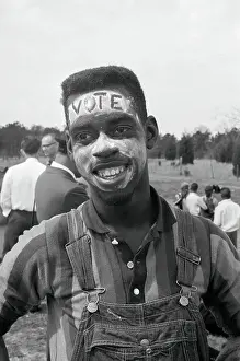 Suffrage Prints: Freedom Marcher BobbySimmons with Lotion on Face Spelling Vote