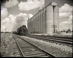 Cargo Prints: Freight Train Passing Grain Elevators