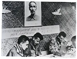 Dove Prints: French Captives Under Picture Of Ho Chi Minh