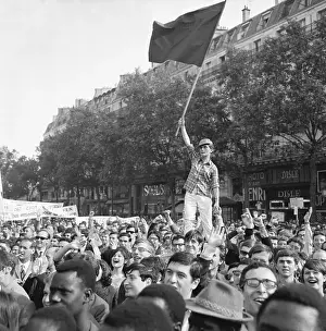 French Girl with Flag Hoisted Above Crowd