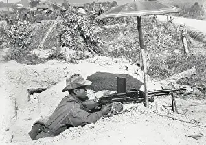 Hanoi Prints: French Soldier Taking Cover in Trench and Under Umbrella