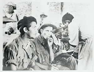 Hanoi Prints: French Soldiers in Indo China Smoking in Huddle