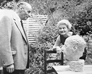 Friends Viewing Sculpted Head
