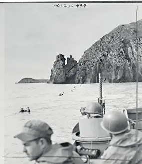 Submerged Prints: Frogmen Watched by Navy Craft