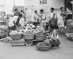 Fruit Vendor Sorting His Goods