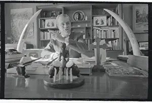 G. Mennen William Speaking at Desk