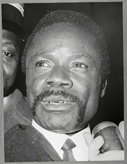 Gabon President Omar Bongo Speaks Into Microphone