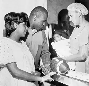 Gale and Lynn Sayers Watch their New Baby Gail Lynne