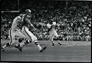 Gale Sayers Runs With Football in Game