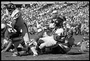 Gale Sayers is Taken Down by the St. Louis Defense
