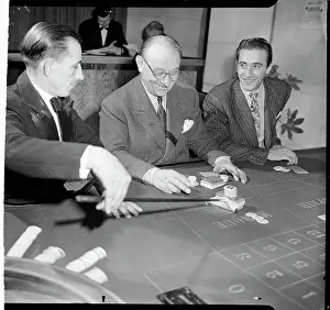 Gamblers at the Baccarat Table