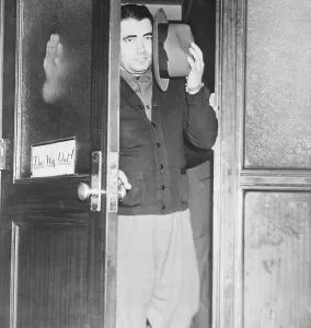 Murderer Prints: Gangster Charles Workman Opening Police Station Door