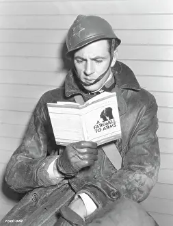 Gary Cooper Reading A Farewell To Arms on Set