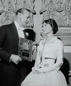 Plaque Prints: Gary Cooper Showing His Award to Audrey Hepburn