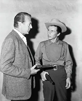 Gary Cooper Showing Frank Sinatra How to Use a Gun