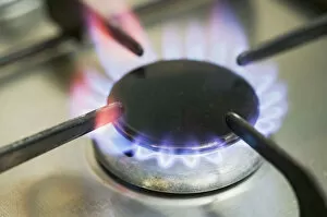 Gas cooker hob, close up of one ring lit up