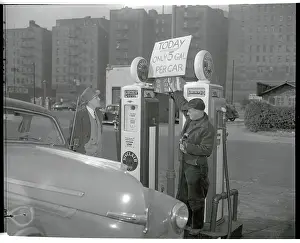 Gas Station Owner Talking with Customer