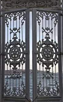 Images Dated 11th November 2012: Gate with views of the Bosphorus from Dolmabahce Palace, Istanbul, Turkey
