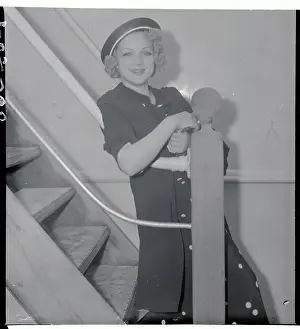 Gay Orlova Posing on Ship Staircase