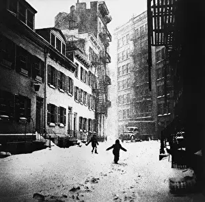 Prints of NEW YORK - 1960: Children play in the snow on Gay street in Greenwich Village in 1960 in New York City, New York. (Photo by David Attie/Getty Images) Portraits, Artworks, and Montages from a Visionary Photographer: Gay Street