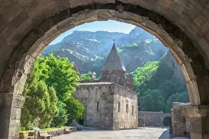 Prints of View of the entrance to Geghard, a medieval monastery and a UNESCO World Heritage Site, surrounded by towering cliffs of Azat River gorge, near Goght, in Kotayk province of Armenia Capturing the Beauty of Landscapes, Travel, and Nature: Geghard Monastery, Goght, Kotayk Province, Armenia