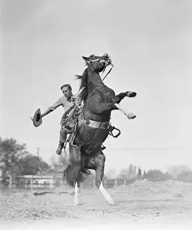 Gene Autry Falling off his Horse
