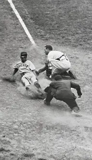 Gene Baker Being Tagged Out