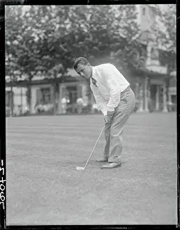 Gene Sarazen Putting on Golf Course