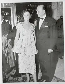 Gene Tierney and Escort Arriving for Premiere of The Egyptian