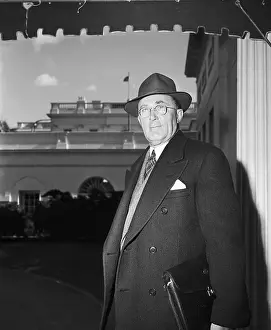 General Electric Official Charles E. Wilson Posing in Overcoat and Hat