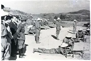Threatening Prints: General Inspecting Rifle Training
