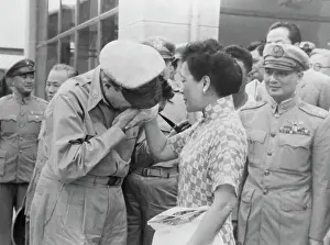 Farewell Prints: General MacArthur Kisses Madame Chiang Kai-Shek