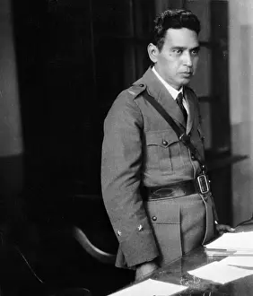 General Maxmiliano Hernandez Martinez Standing at Table