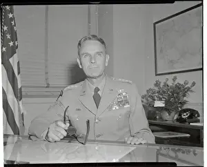 General Maxwell Taylor Sitting at Desk