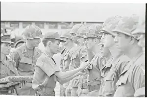 General Pinning Medal on Soldier