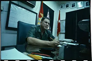 Robert E Prints: General Robert Cushman Sitting at Desk