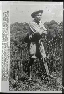 General Tran Do Standing with Arms Crossed