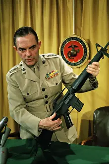 General Wallace M. Greene, Jr. Holding M16 Rifle