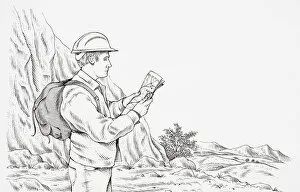 Looking Down Gallery: Geologist wearing hard hat, carrying rucksack, looking at a map