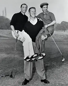 George Bayer Holding Up Willie Shoemaker and Eddie Arcaro