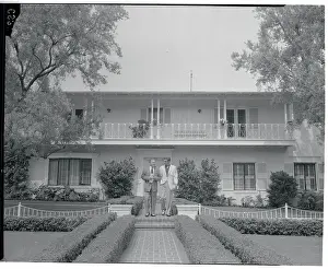 George Burns and Photographer in Front of House