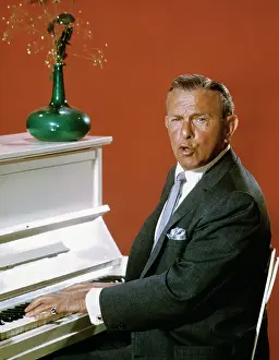 George Burns Singing at Piano