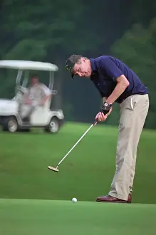 George Bush Playing Golf