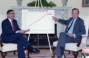 George Bush Pointing to Economic Chart