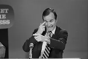George Bush Pointing to His Eye