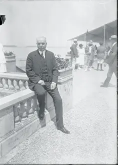 George Cortelyou Resting on a Balcony Ledge