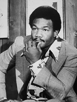 Prints of October 1976: American boxer George Foreman on the day he announced plans to regain the heavyweight title, New York City. (Photo by Hulton Archive/Getty Images) In the Ring: The Art of Boxing: George Foreman