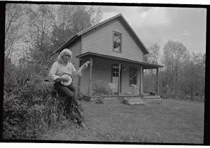 George Gardner Standing in Front of His Home