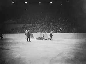 Prints of Goalie George Hainsworth blocks Seibert's slap at the net in a game with the Rangers Frozen Moments: A Journey Through Hockey History: George Hainsworth